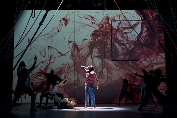 Ammar Duffus (Conor) and the ensemble of A Monster Calls UK Tour.